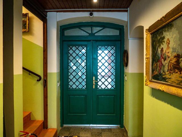 Green front door of the house